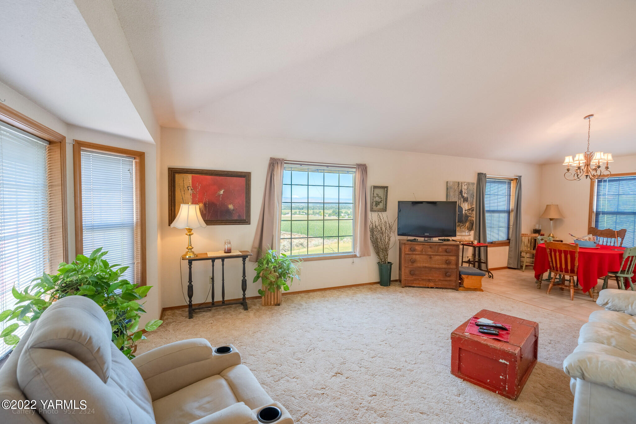 3870 Aaron Road Moxee, WA 98936 - Photo 5 of 33 a living room with furniture and a flat screen tv
