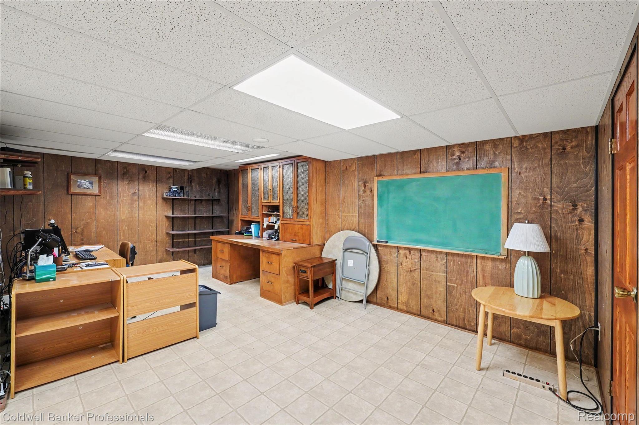 3583 Mitchell Road Metamora, MI 48455 - Photo 29 of 58 Wood-paneled room featuring recessed lighting and a drop ceiling