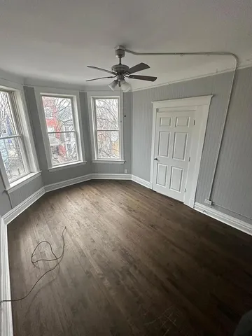 a view of livingroom with hardwood floor and window