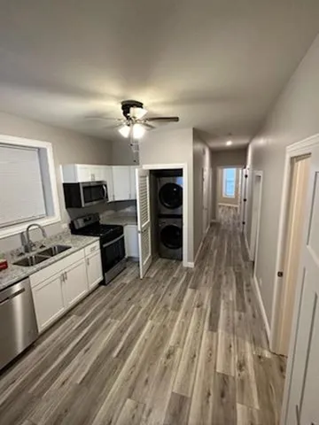 a large kitchen with cabinets