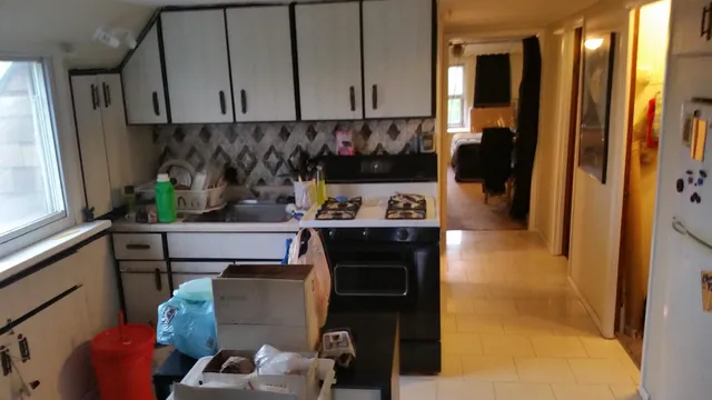 a view of living room with furniture and a window