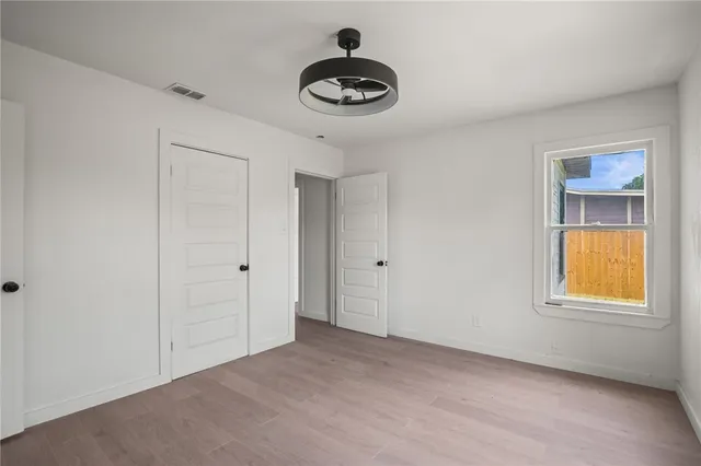 a view of an empty room and window