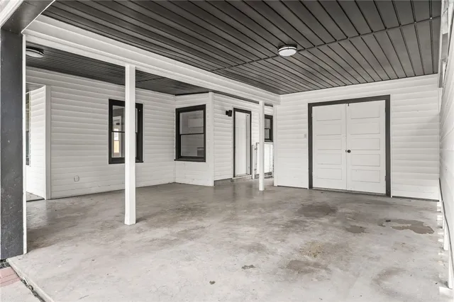 an empty room with windows