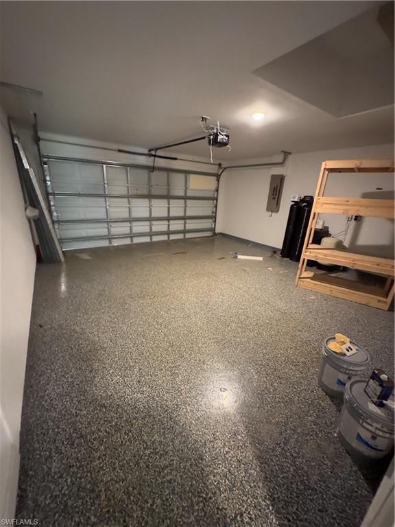 3707 38th Street Southwest Lehigh Acres, FL 33976 - Photo 15 of 16 Garage featuring electric panel