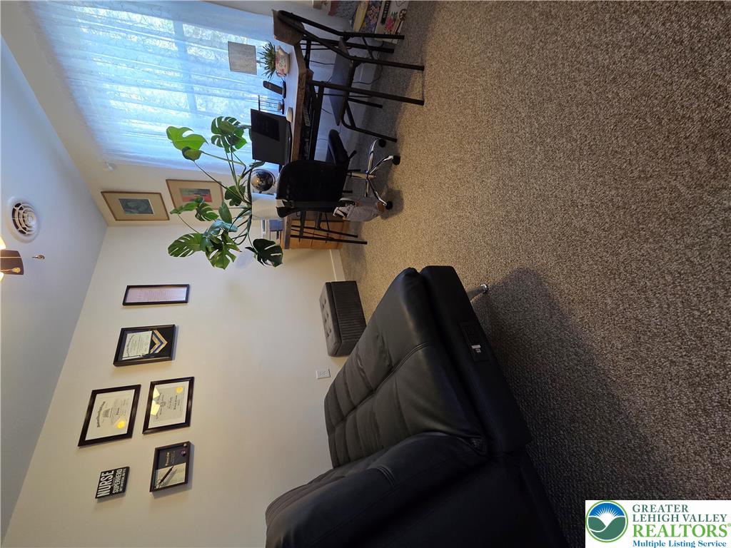 89 Short Ridge Road Albrightsville, PA 18210 - Photo 40 of 71 Plush wall-to-wall carpeting and a wide window create a comfortable, quiet workspace.