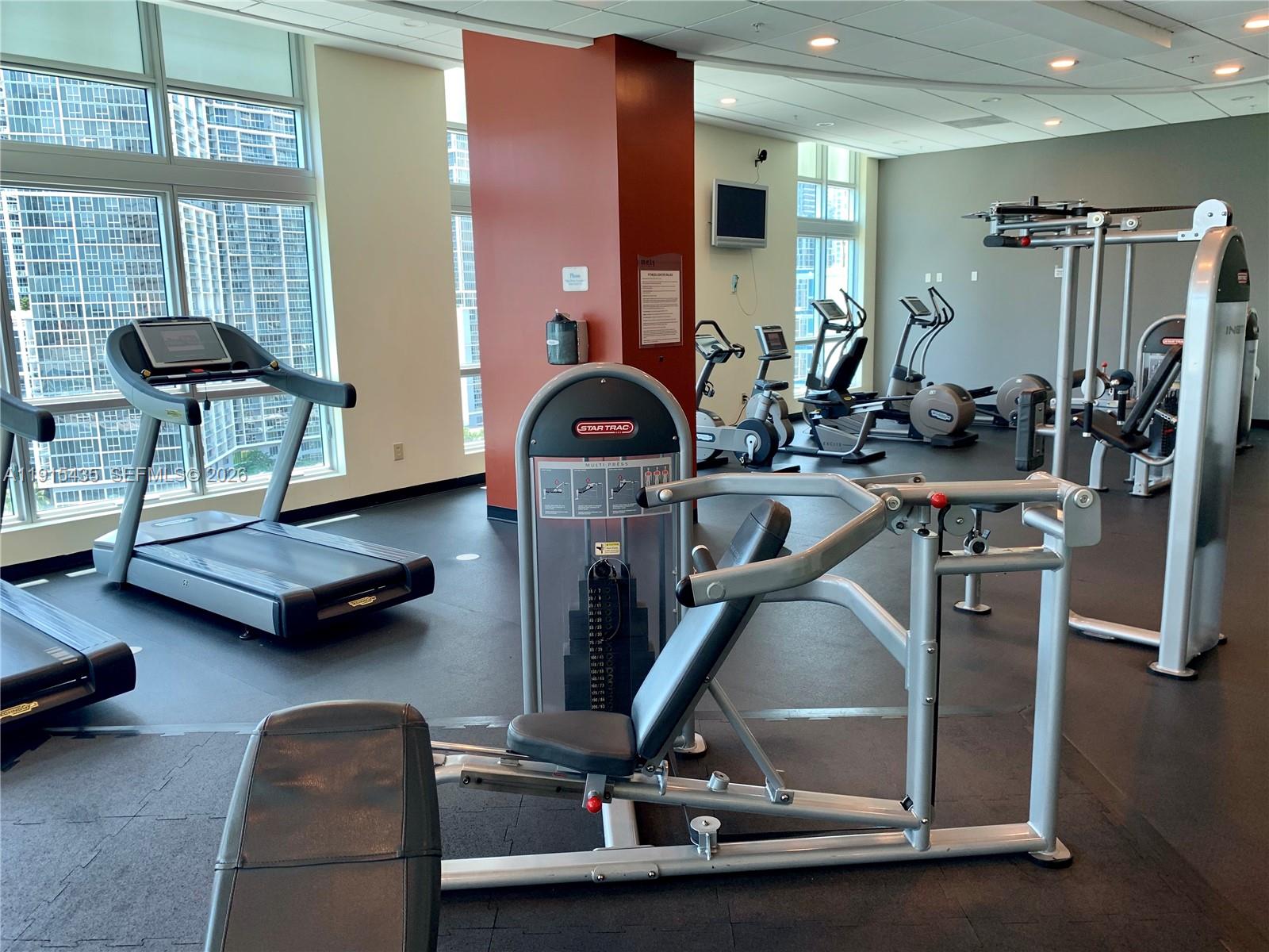 300 South Biscayne Boulevard, Unit T1509 Miami, FL 33131 - Photo 20 of 27 a view of a room with gym equipment