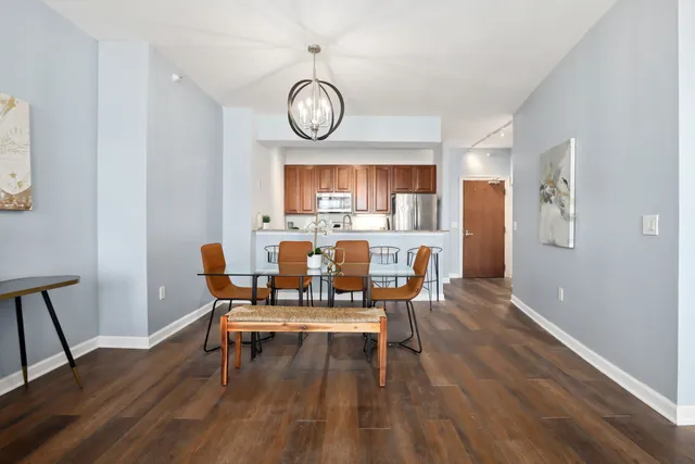 a work room with furniture and wooden floor