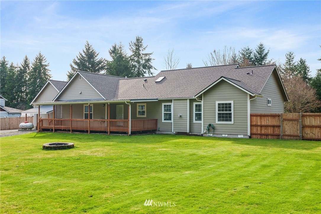 18622 Melon Street Southwest Rochester, WA 98579 - Photo 28 of 33 a front view of a house with a yard