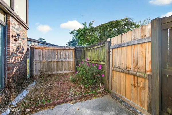 a view of a backyard with garden