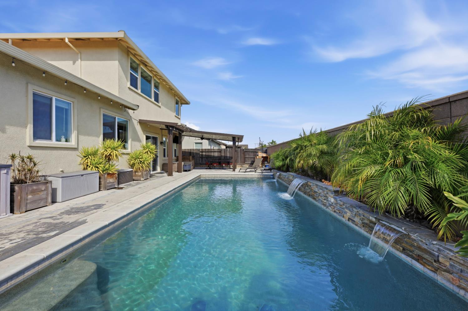2012 Van Ruiten Drive Lodi, CA 95242 - Photo 3 of 49 a view of a house with a swimming pool