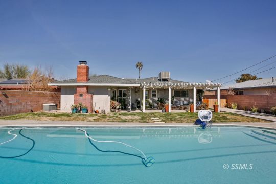 429 West Perdew Avenue Ridgecrest, CA 93555 - Photo 49 of 50 a front view of a house with a yard