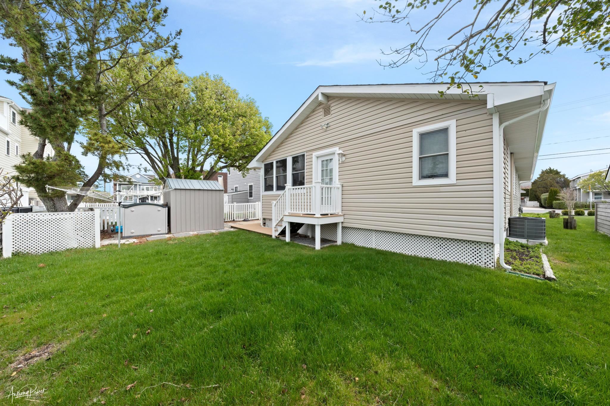 2968 First Avenue Avalon, NJ 08202 - Photo 23 of 23 a view of a house with a backyard