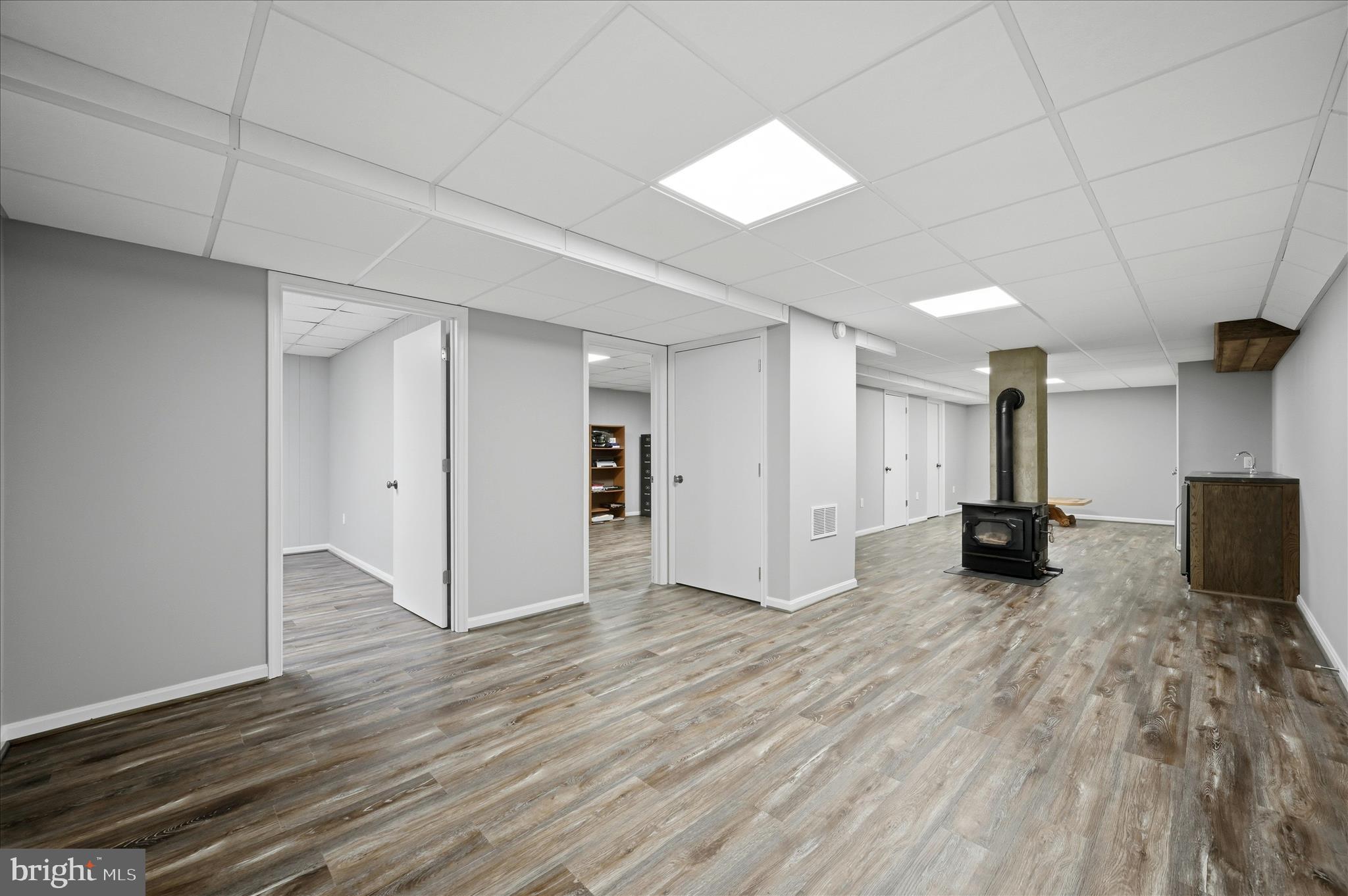 2171 Oranda Road Strasburg, VA 22657 - Photo 37 of 69 Basement open floor area w/woodstove