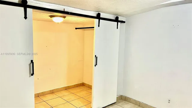 a bathroom with a shower and a tub