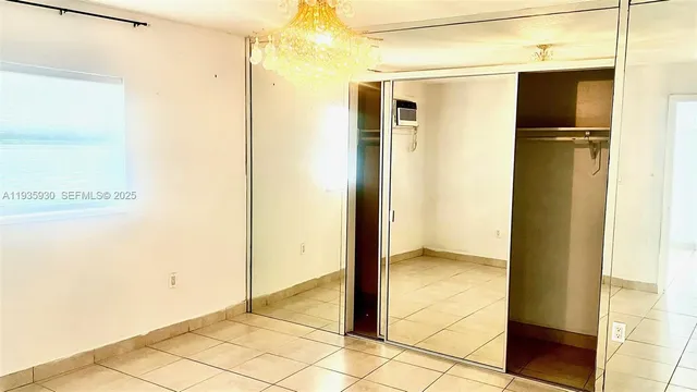 a view of a bathroom with a glass door