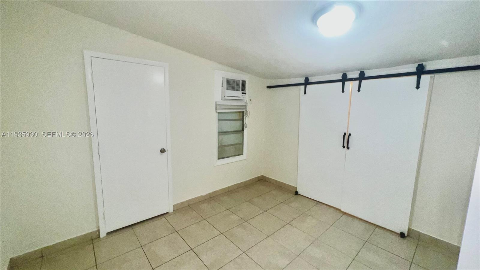 3560 Southwest 25th Terrace Miami, FL 33133 - Photo 10 of 12 a view of an empty room