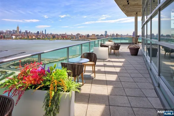 a view of a kitchen with a large window