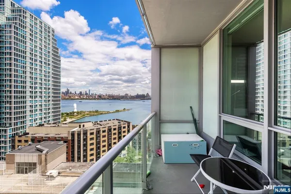 a view of balcony with furniture
