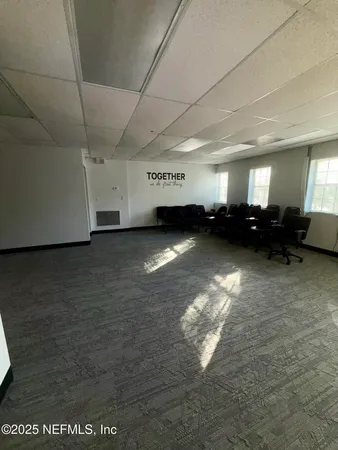 a view of a livingroom with furniture