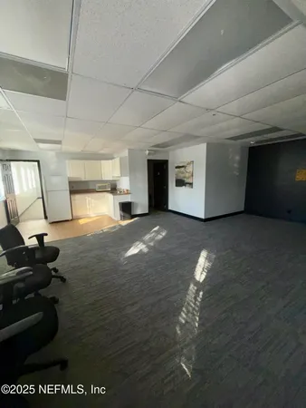 a view of a livingroom with furniture