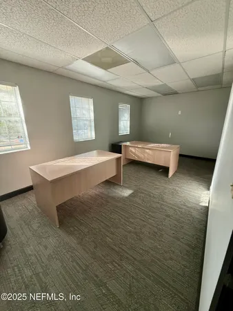 a living room with a couch and a table