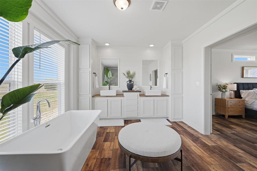 249 Mt Pleasant Road Valley View, TX 76272 - Photo 24 of 40 a view of a kitchen area with furniture and wooden floor