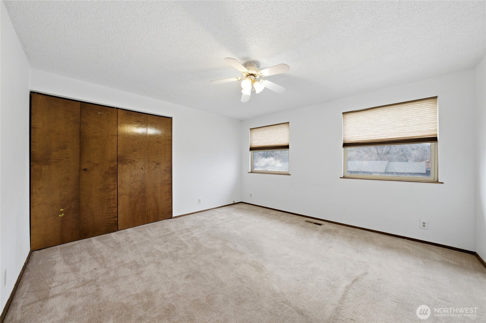 162 Tara Street Milton Freewater, OR 97862 - Photo 11 of 21 a view of an empty room with a window