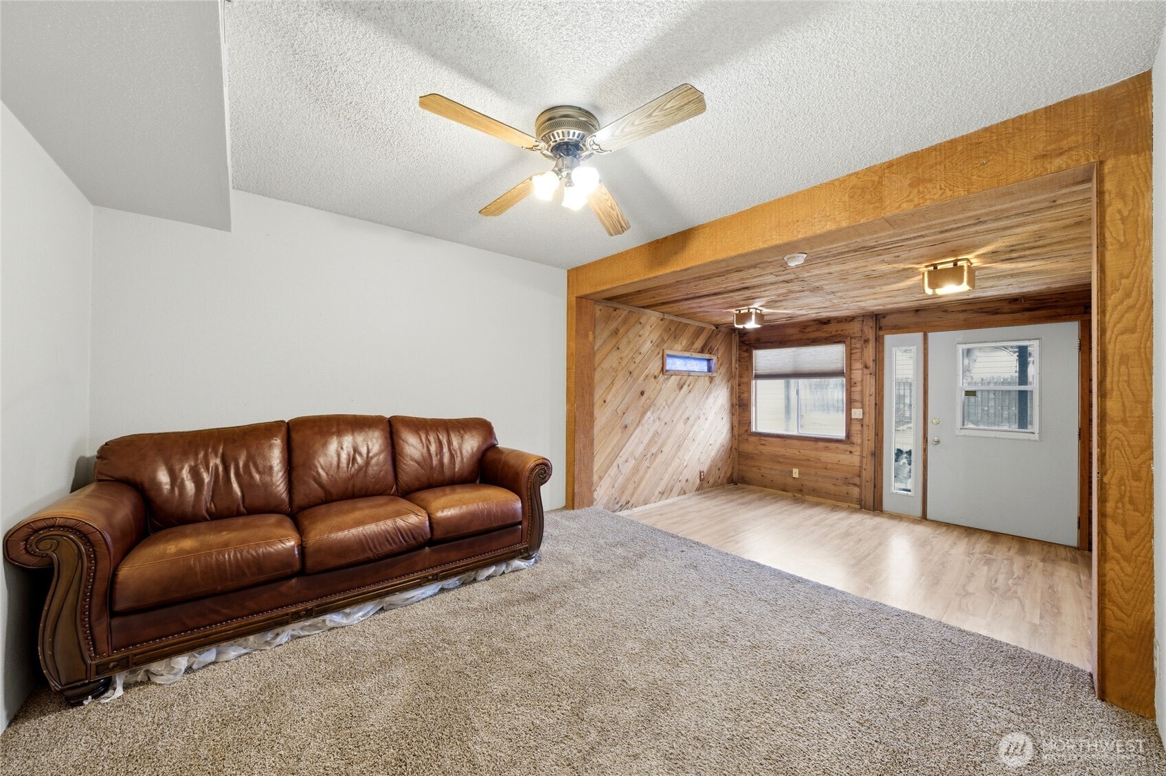 162 Tara Street Milton Freewater, OR 97862 - Photo 13 of 21 a living room with furniture and a ceiling fan