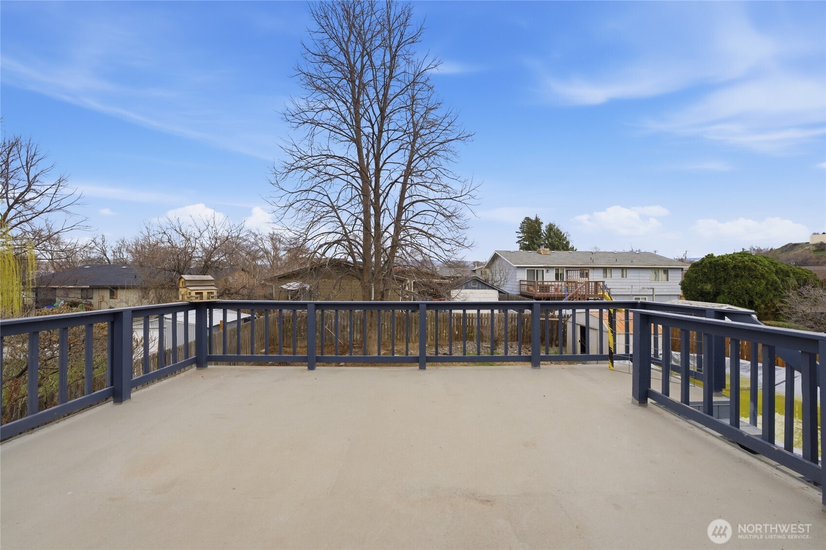 162 Tara Street Milton Freewater, OR 97862 - Photo 19 of 21 a view of a balcony with wooden fence and floor