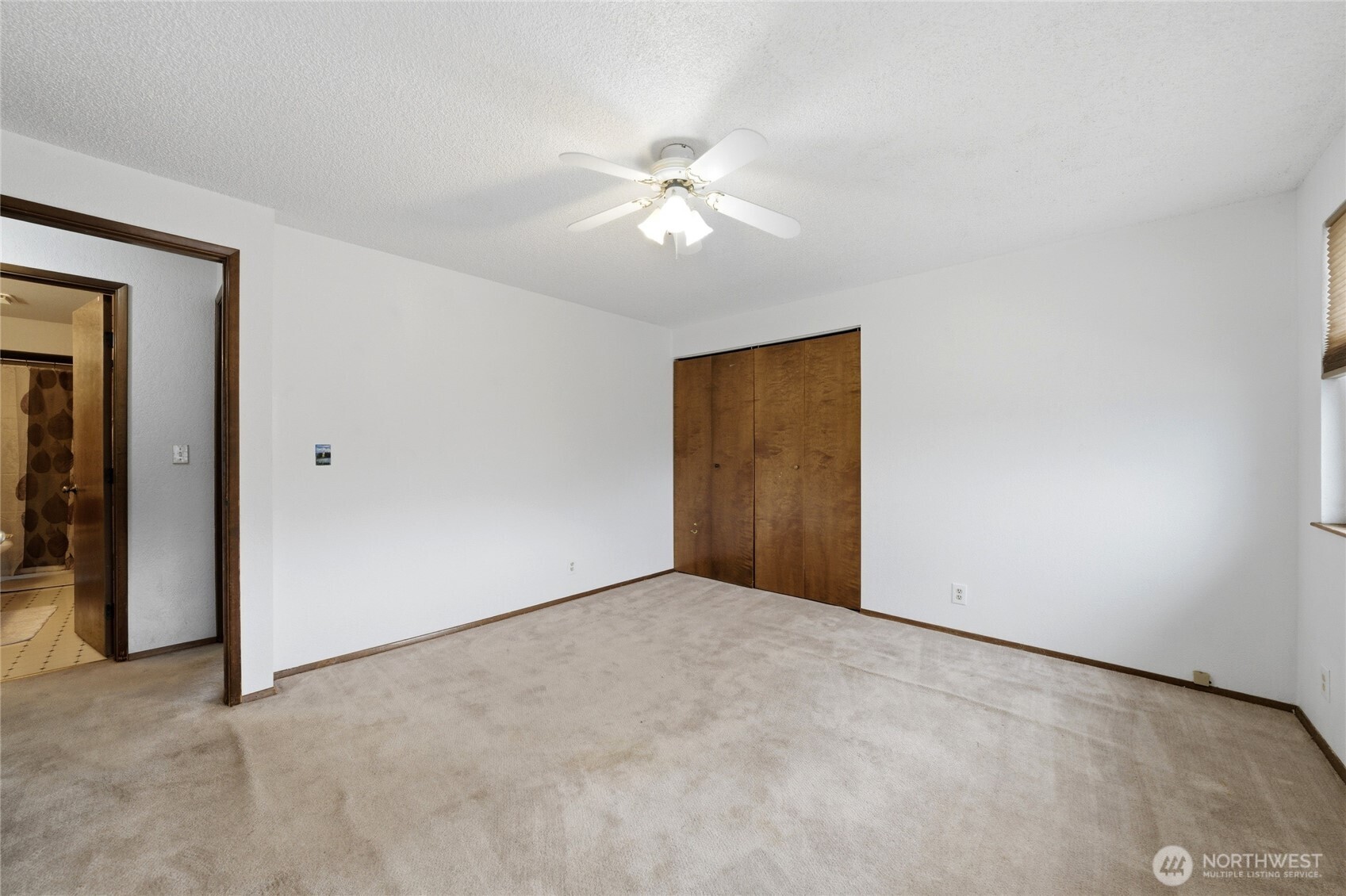 162 Tara Street Milton Freewater, OR 97862 - Photo 8 of 21 a view of an empty room with a ceiling fan