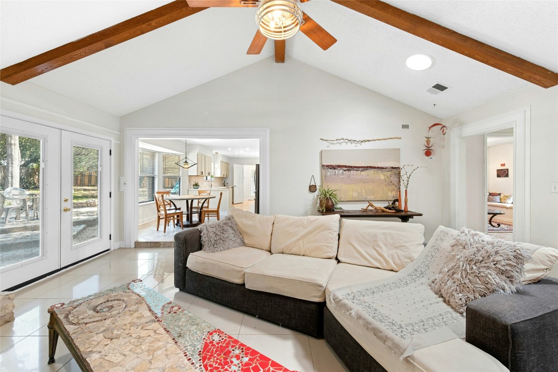 6906 Bayridge Terrace Austin, TX 78759 - Photo 15 of 35 a living room with furniture and a table