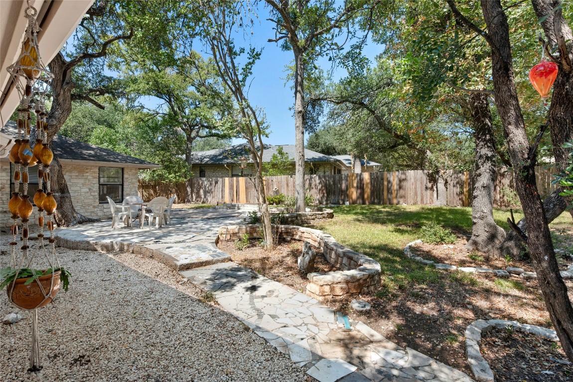 6906 Bayridge Terrace Austin, TX 78759 - Photo 31 of 35 a view of a house with backyard and sitting area