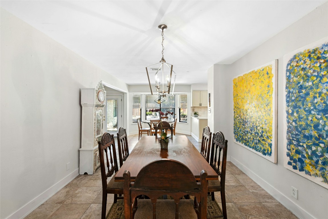 6906 Bayridge Terrace Austin, TX 78759 - Photo 7 of 35 a view of a dining room with furniture window and outside view