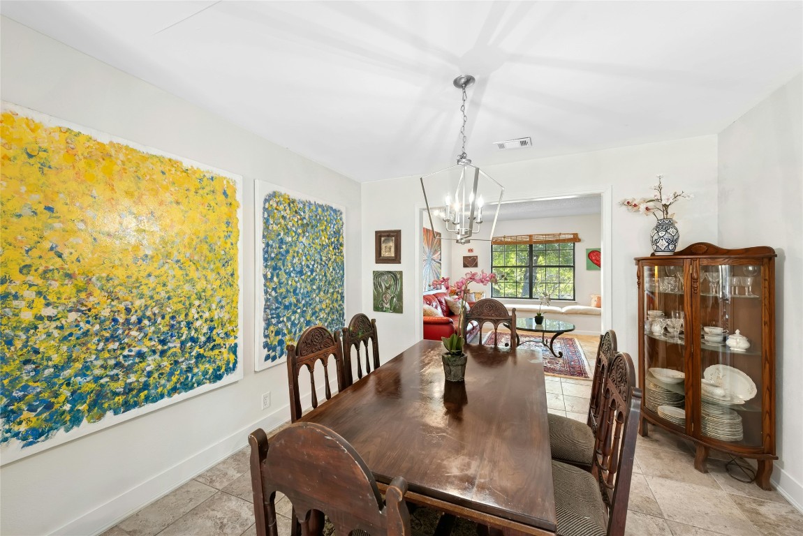 6906 Bayridge Terrace Austin, TX 78759 - Photo 8 of 35 a view of a dining room with furniture window and outside view