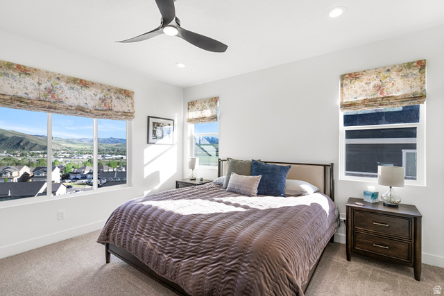 851 Grandview Drive Morgan, UT 84050 - Photo 18 of 68 Bedroom featuring expansive windows, recessed lighting, a ceiling fan, and carpet flooring