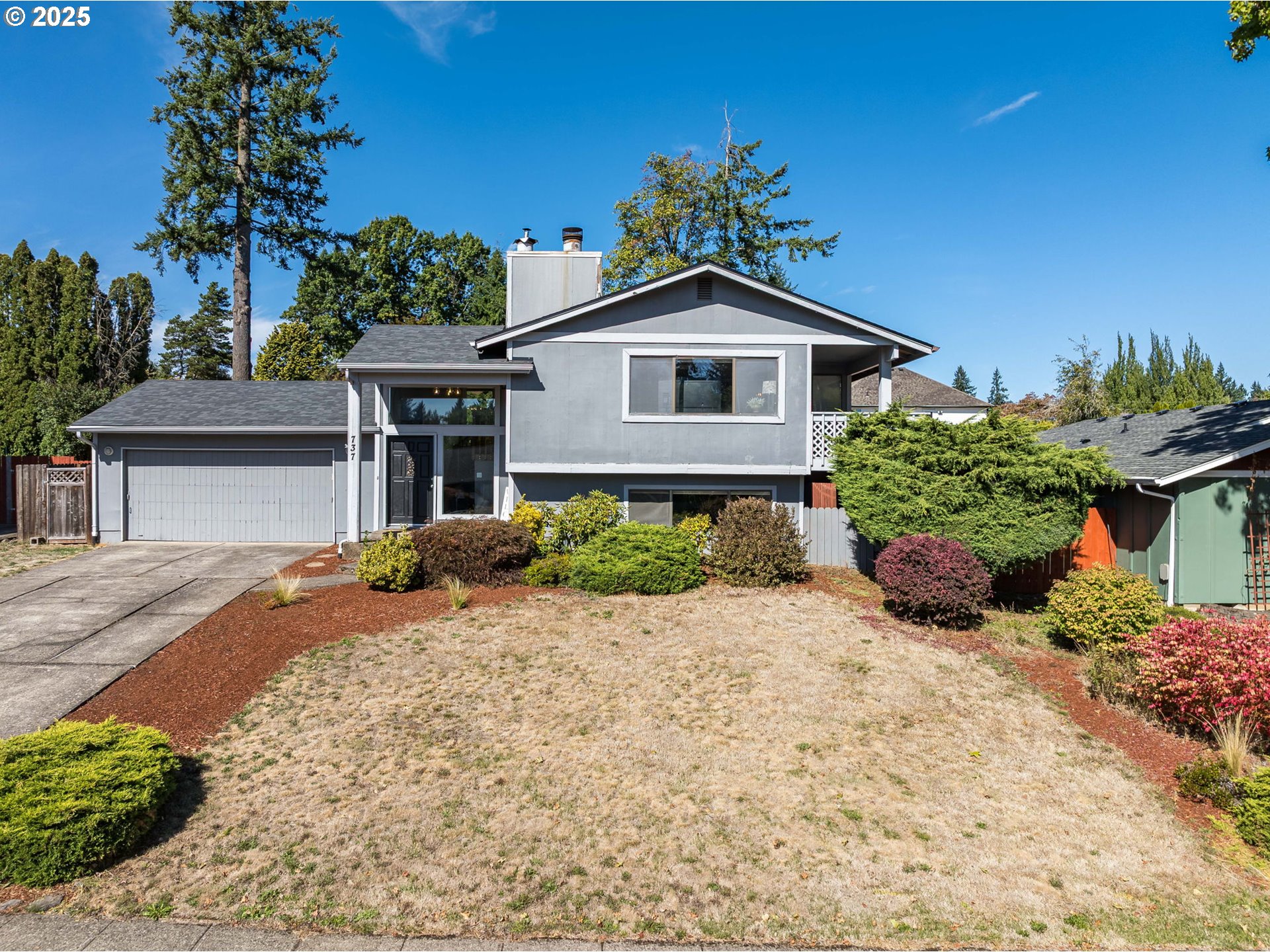 737 Northwest 20th Avenue Camas, WA 98607 - Photo 1 of 40 a front view of a house with a yard