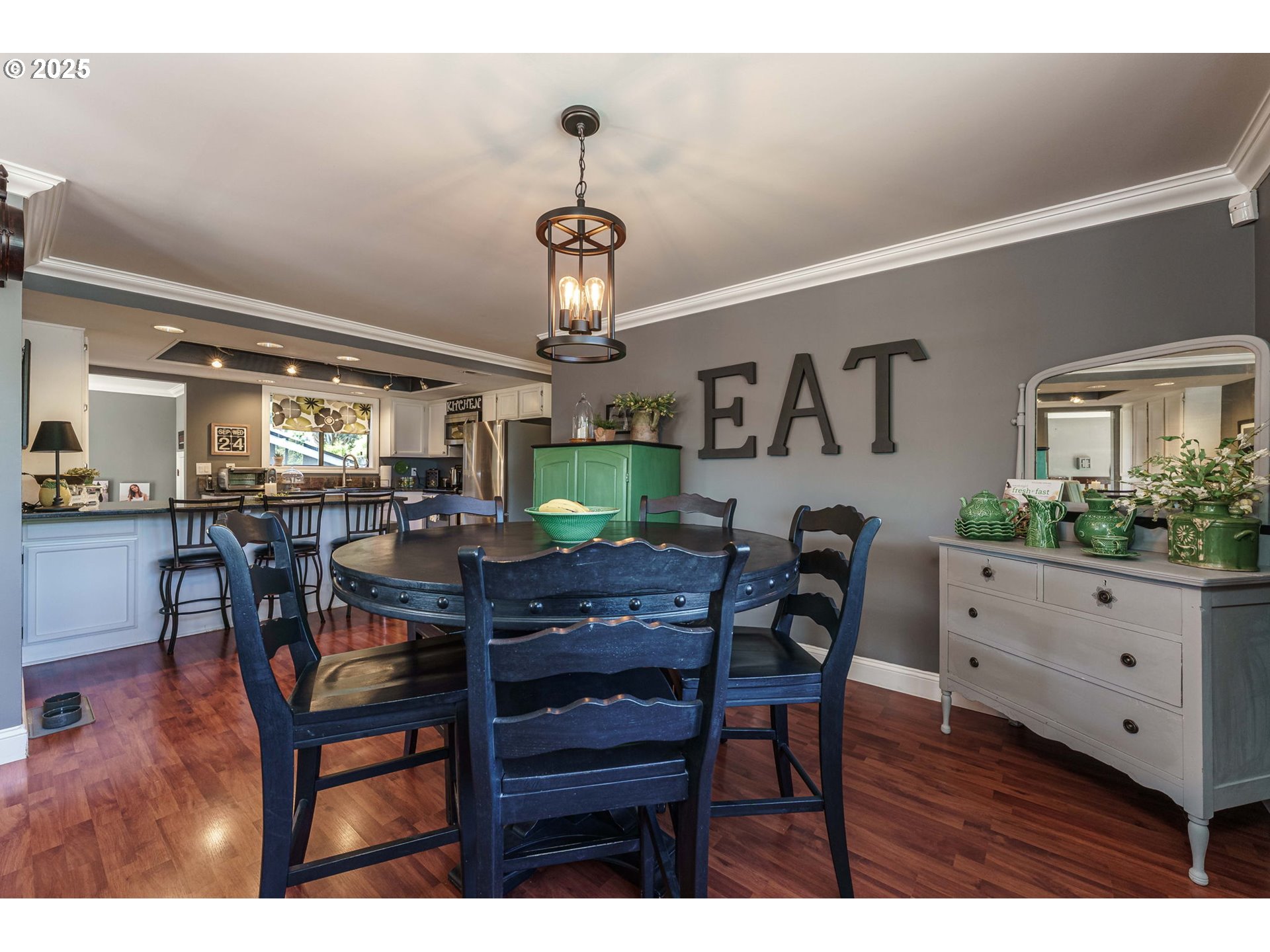 737 Northwest 20th Avenue Camas, WA 98607 - Photo 11 of 40 a view of a dining room with furniture and wooden floor