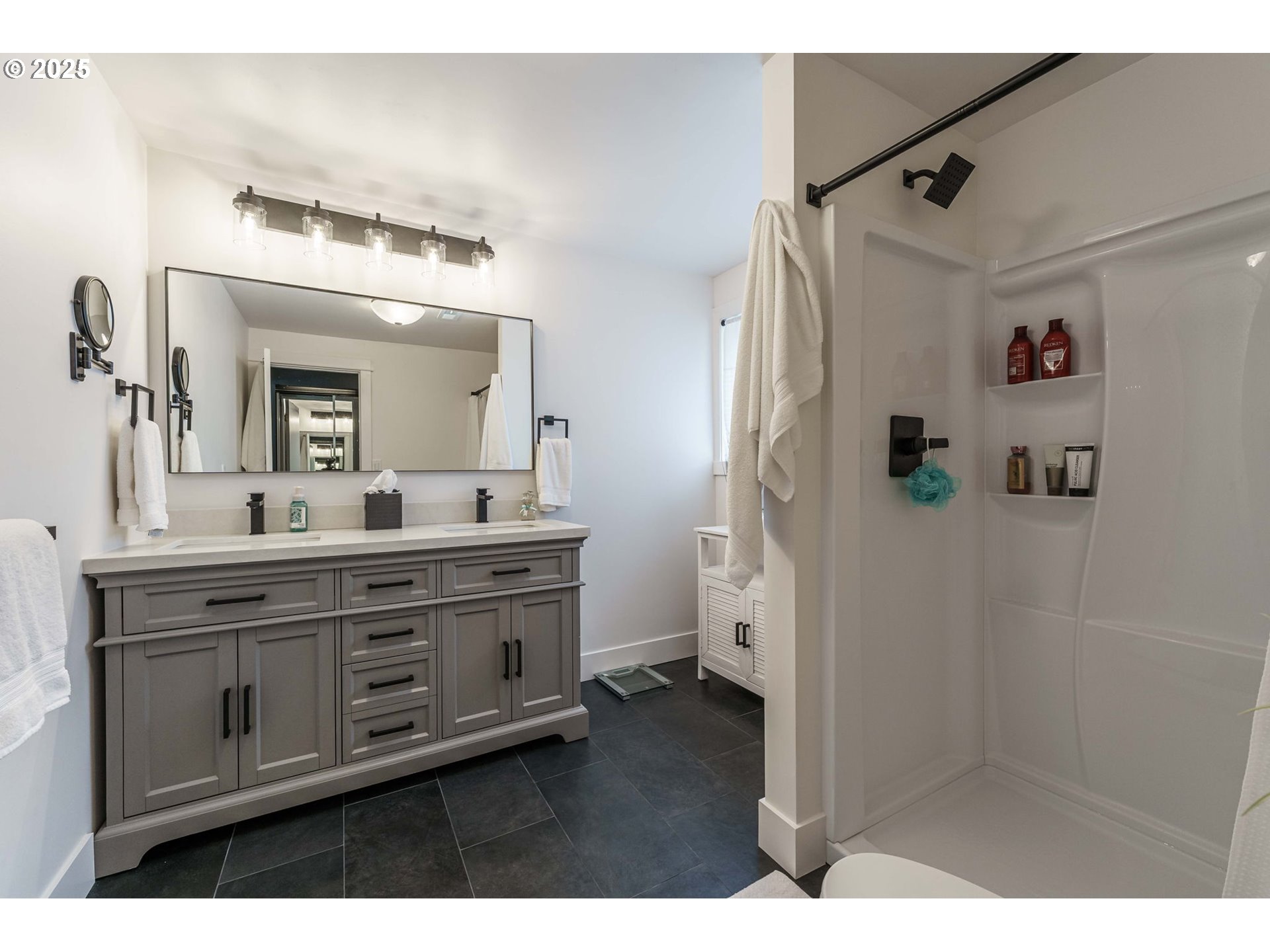 737 Northwest 20th Avenue Camas, WA 98607 - Photo 21 of 40 a bathroom with a sink vanity and mirror