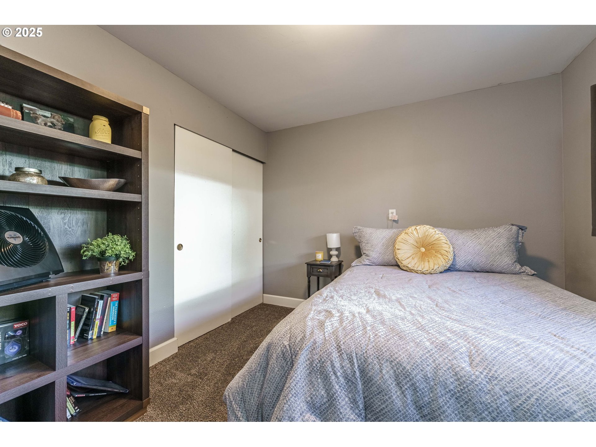 737 Northwest 20th Avenue Camas, WA 98607 - Photo 31 of 40 a bedroom with a bed and a book shelf