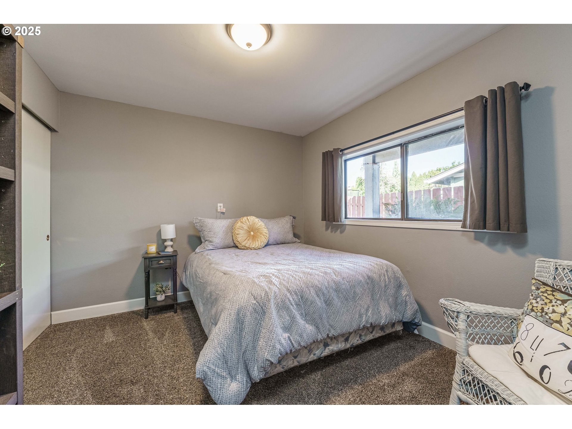 737 Northwest 20th Avenue Camas, WA 98607 - Photo 32 of 40 a bedroom with a bed and a window