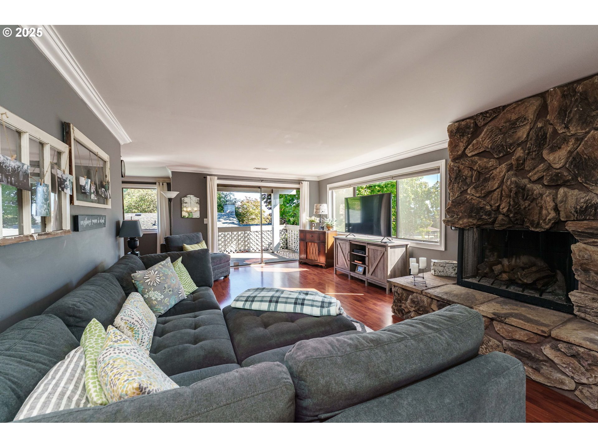 737 Northwest 20th Avenue Camas, WA 98607 - Photo 5 of 40 a living room with furniture and a fireplace