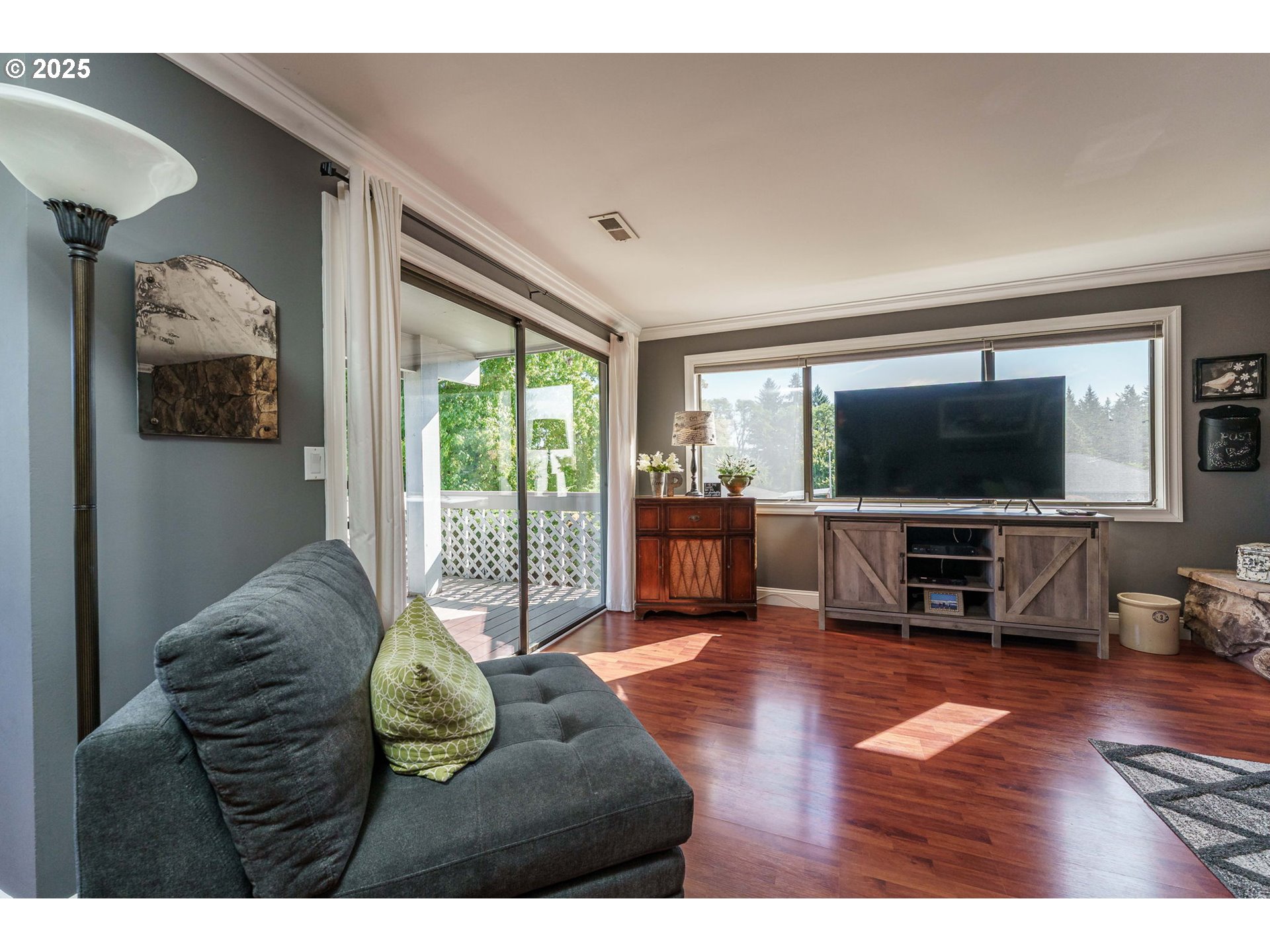 737 Northwest 20th Avenue Camas, WA 98607 - Photo 9 of 40 a living room with furniture and a flat screen tv