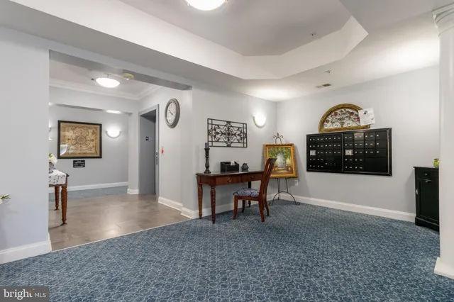 a view of a workspace with furniture