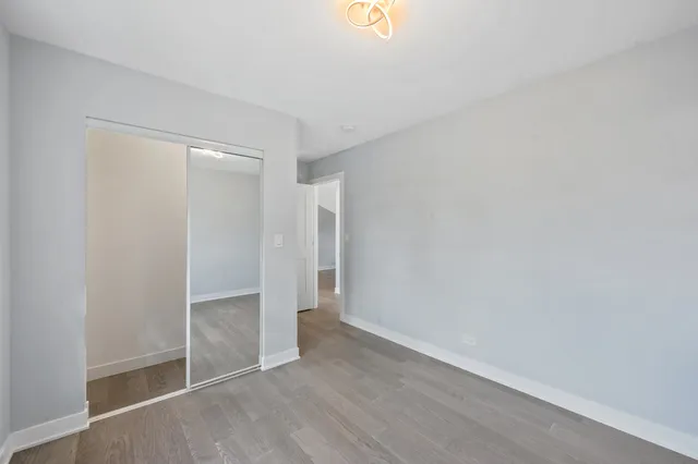 a view of empty room with windows