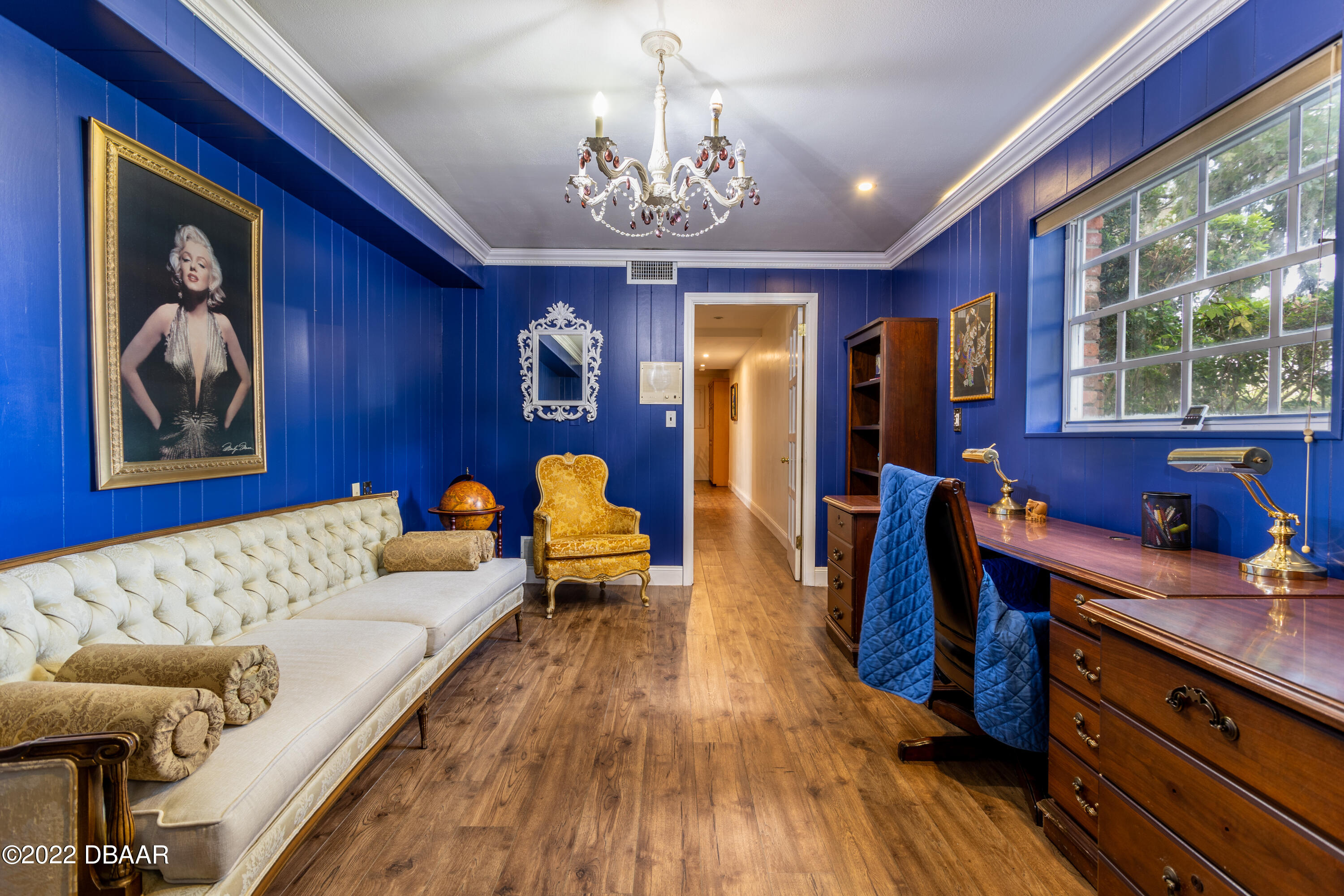 82 North St Andrews Drive Ormond Beach, FL 32174 - Photo 27 of 60 a living room with furniture and a large window