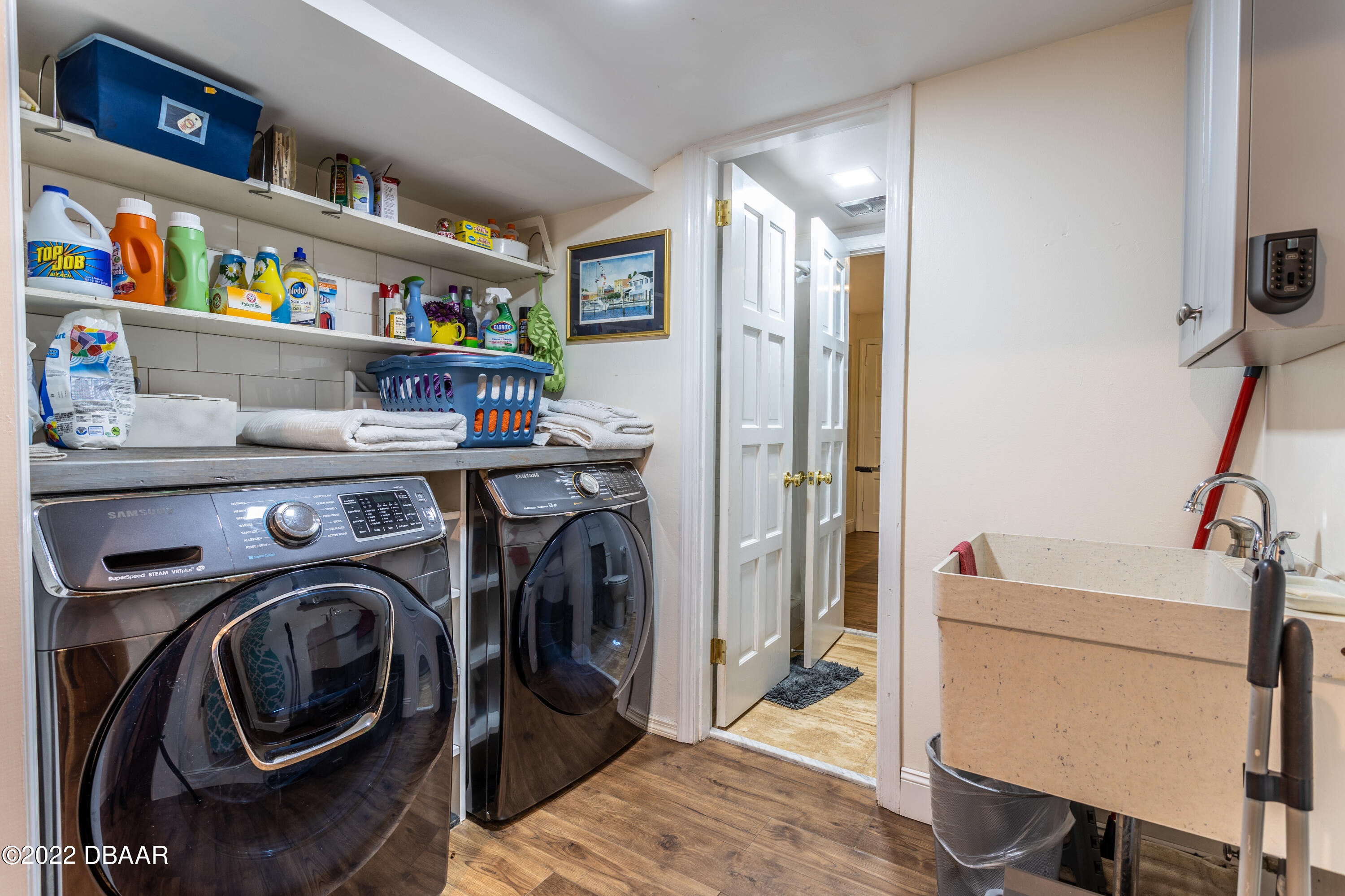 82 North St Andrews Drive Ormond Beach, FL 32174 - Photo 34 of 60 a view of a storage and utility room with washer and dryer