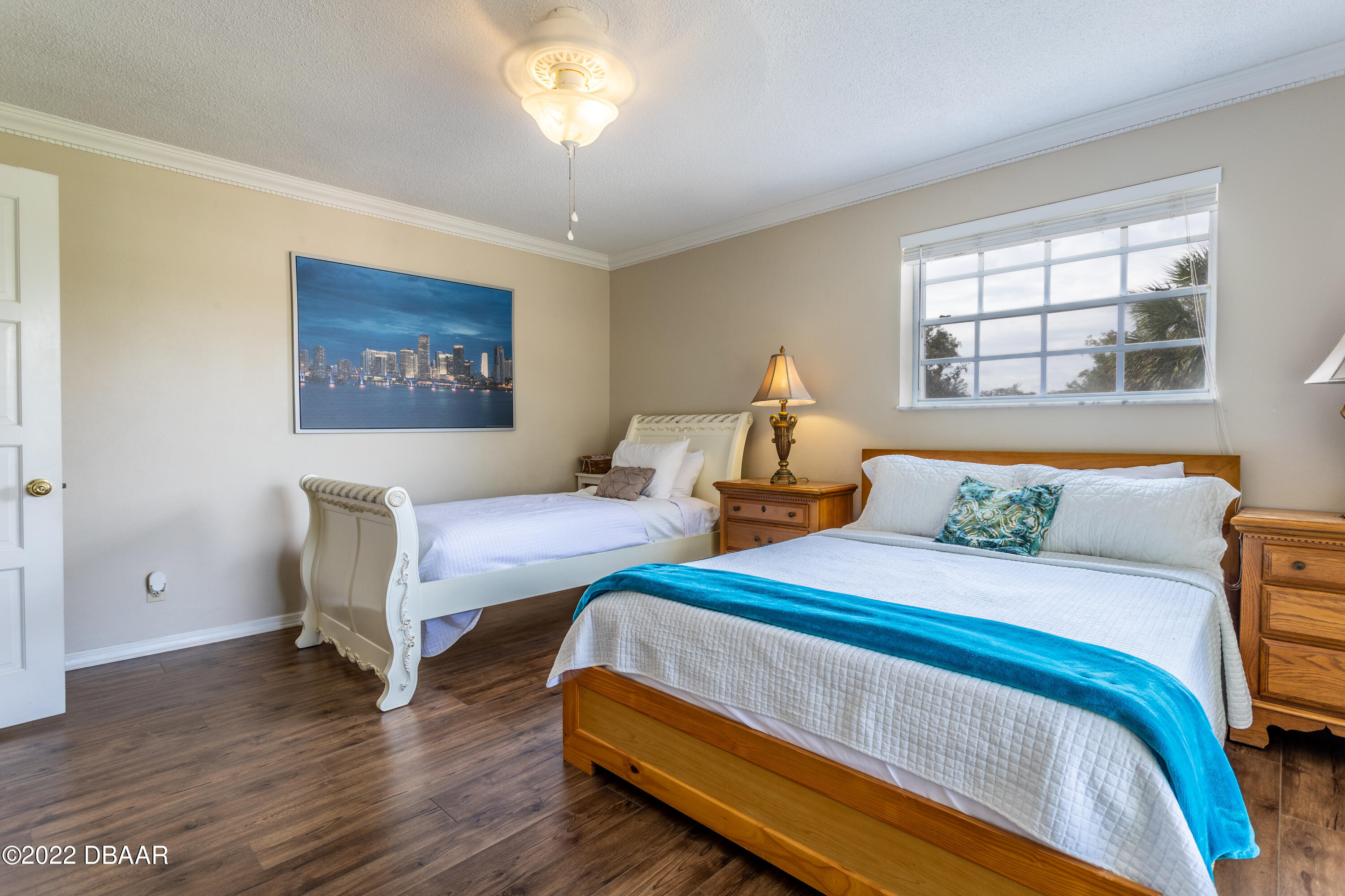 82 North St Andrews Drive Ormond Beach, FL 32174 - Photo 36 of 60 a bedroom with two beds and a window