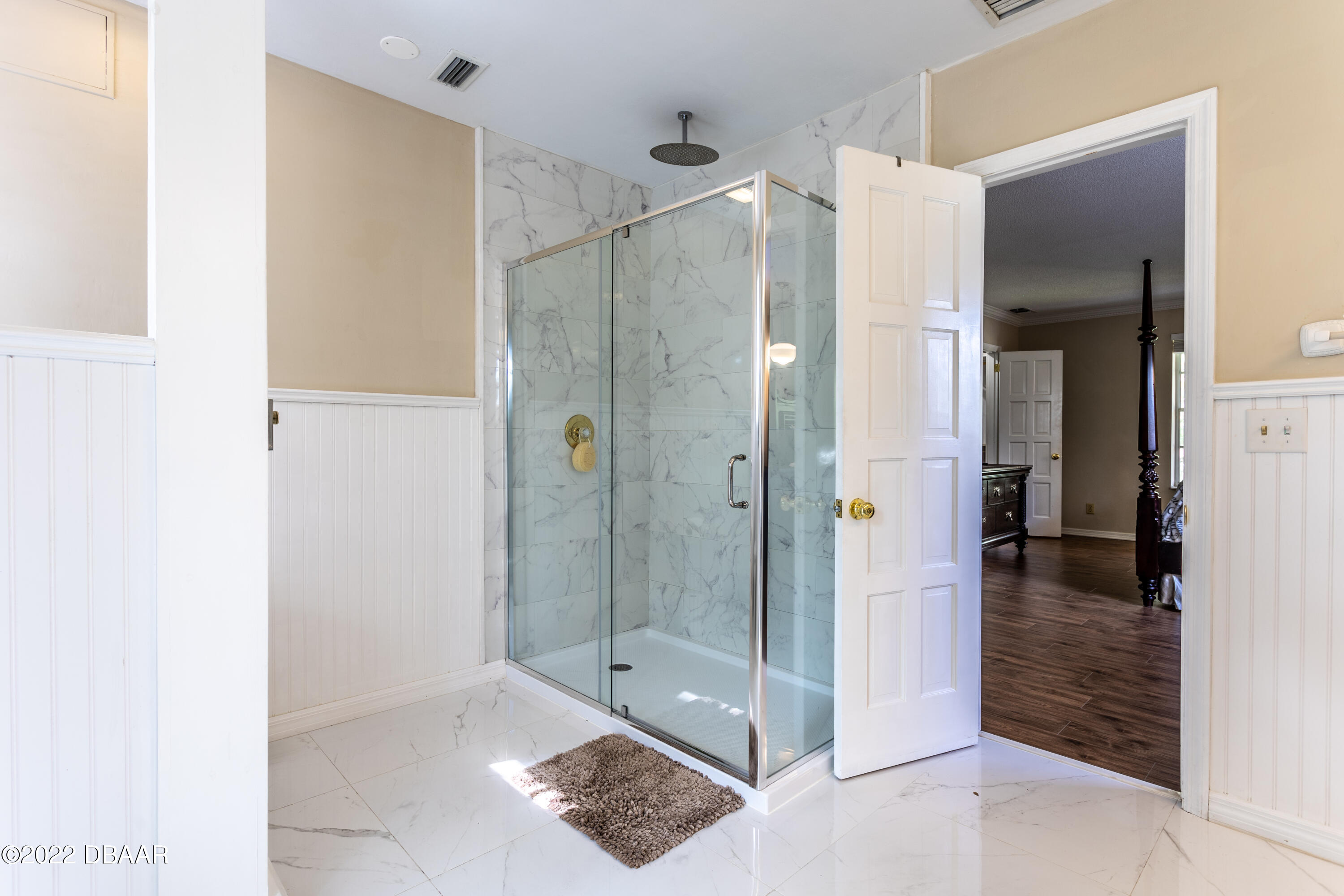 82 North St Andrews Drive Ormond Beach, FL 32174 - Photo 50 of 60 a bathroom with a shower and a glass door