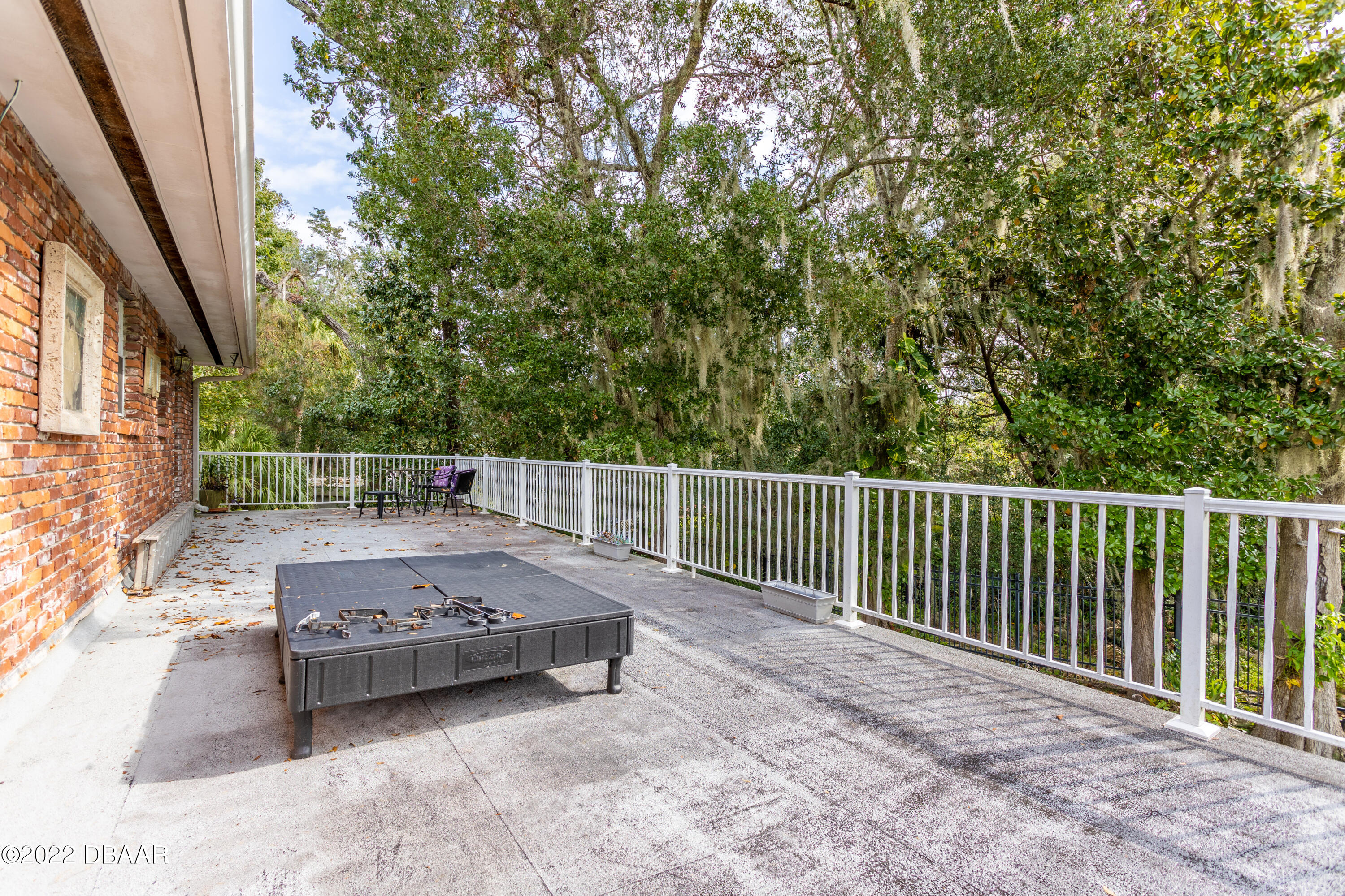 82 North St Andrews Drive Ormond Beach, FL 32174 - Photo 52 of 60 a view of a terrace with chairs