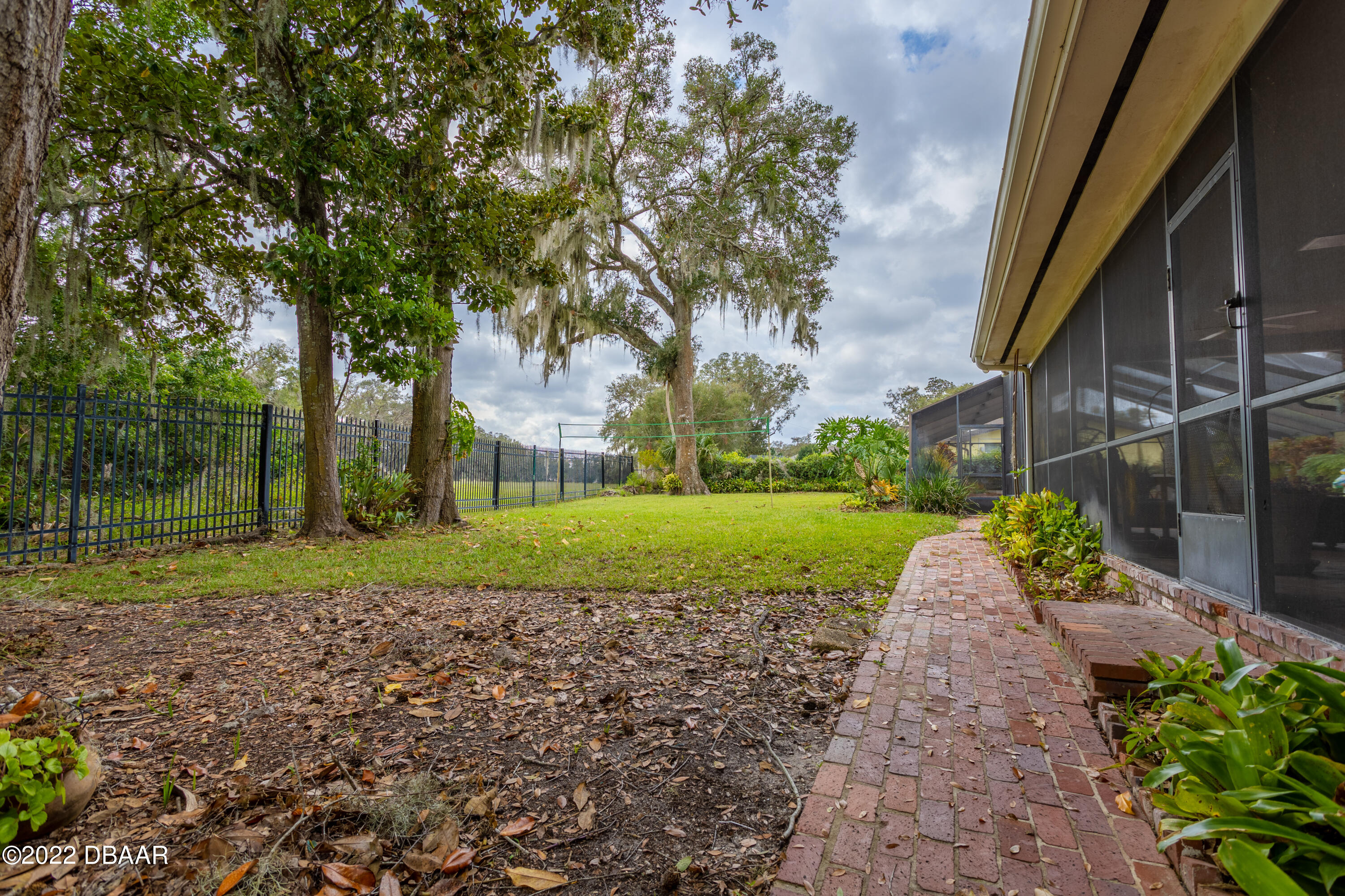 82 North St Andrews Drive Ormond Beach, FL 32174 - Photo 60 of 60 a view of a park that has a large tree